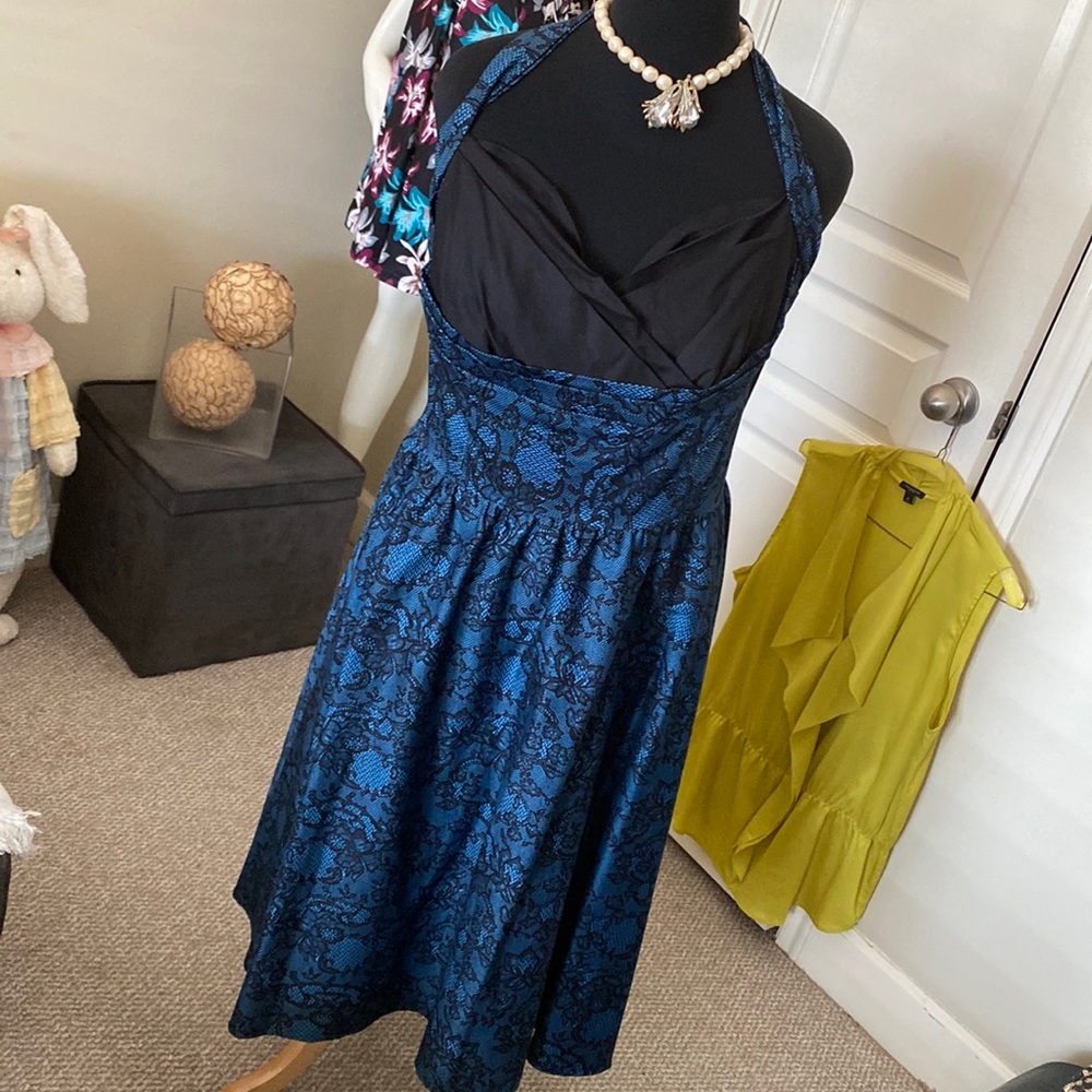 A beautiful backless dress by Stop Staring.